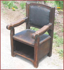 Arts and Crafts period arm chair.